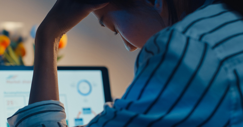 File image showing a woman struggling with her workload